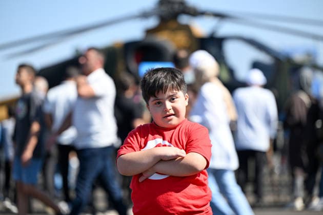 TEKNOFEST Southeast in Turkiye s Sanliurfa SANLIURFA, TURKIYE - OCTOBER 04: A boy wearing a Turkish flag T-shirt attends the Aviation, Space and Technology Festival (TEKNOFEST), the world s largest aviation, space and technology festival, at Sanliurfa GAP Airport during its 15th edition in Sanliurfa, Turkiye, on October 04, 2026. The festival is organized by the Turkish Ministry of Industry and Technology and the T3 Foundation, with Anadolu serving as its Global Communication Partner. Adsiz Gunebakan Anadolu Sanliurfa Turkey. Editorial use only. Please get in touch for any other usage.  Copyright: x2026xAnadoluxAdsizxGunebakanx