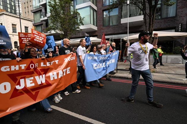 October 4, 2026, London, London, UK: London, UK. Demonstrators representing the Jewish Block take part in a march and rally to mark the 90th anniversary of The Battle of Cable Street in the East End of London. All over the country in 1936, Mosley s British Union of Fascists were chased off the streets by a strong working class who knew that the politics of hate and division offers no solutions. The Battle of Cable Street on 4 October 1936 was by far the countryâ€⠢s biggest mobilisation against fascism. London UK - ZUMAl94_ 20261004_zaf_l94_035 Copyright: xRayxTangx