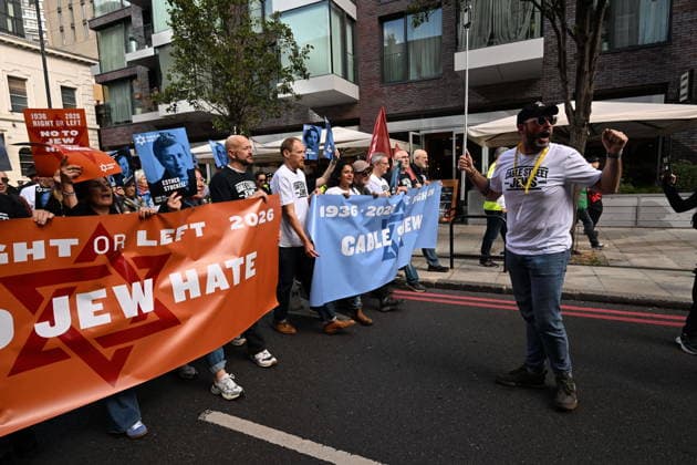 October 4, 2026, London, London, UK: London, UK. Demonstrators representing the Jewish Block take part in a march and rally to mark the 90th anniversary of The Battle of Cable Street in the East End of London. All over the country in 1936, Mosley s British Union of Fascists were chased off the streets by a strong working class who knew that the politics of hate and division offers no solutions. The Battle of Cable Street on 4 October 1936 was by far the countryâ€⠢s biggest mobilisation against fascism. London UK - ZUMAl94_ 20261004_zaf_l94_036 Copyright: xRayxTangx