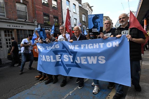 October 4, 2026, London, London, UK: London, UK. Demonstrators representing the Jewish Block take part in a march and rally to mark the 90th anniversary of The Battle of Cable Street in the East End of London. All over the country in 1936, Mosley s British Union of Fascists were chased off the streets by a strong working class who knew that the politics of hate and division offers no solutions. The Battle of Cable Street on 4 October 1936 was by far the countryâ€⠢s biggest mobilisation against fascism. London UK - ZUMAl94_ 20261004_zaf_l94_046 Copyright: xRayxTangx