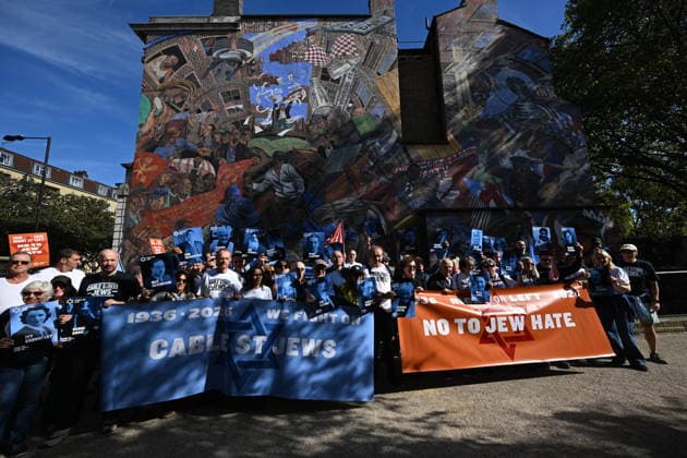 October 4, 2026, London, London, UK: London, UK. Demonstrators representing the Jewish Block take part in a march and rally to mark the 90th anniversary of The Battle of Cable Street in the East End of London. All over the country in 1936, Mosley s British Union of Fascists were chased off the streets by a strong working class who knew that the politics of hate and division offers no solutions. The Battle of Cable Street on 4 October 1936 was by far the countryâ€⠢s biggest mobilisation against fascism. London UK - ZUMAl94_ 20261004_zaf_l94_052 Copyright: xRayxTangx