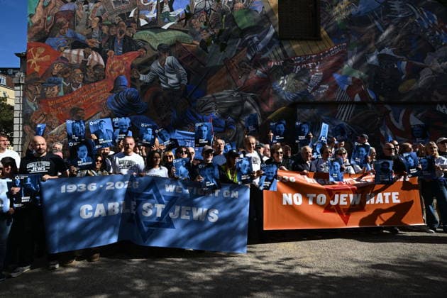 October 4, 2026, London, London, UK: London, UK. Demonstrators representing the Jewish Block take part in a march and rally to mark the 90th anniversary of The Battle of Cable Street in the East End of London. All over the country in 1936, Mosley s British Union of Fascists were chased off the streets by a strong working class who knew that the politics of hate and division offers no solutions. The Battle of Cable Street on 4 October 1936 was by far the countryâ€⠢s biggest mobilisation against fascism. London UK - ZUMAl94_ 20261004_zaf_l94_051 Copyright: xRayxTangx