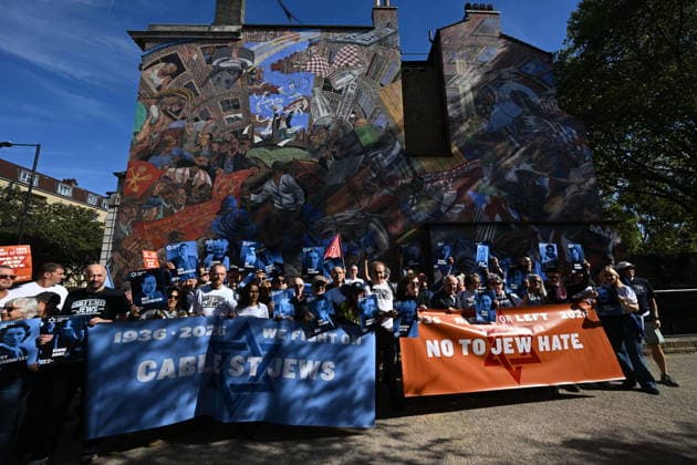 October 4, 2026, London, London, UK: London, UK. Demonstrators representing the Jewish Block take part in a march and rally to mark the 90th anniversary of The Battle of Cable Street in the East End of London. All over the country in 1936, Mosley s British Union of Fascists were chased off the streets by a strong working class who knew that the politics of hate and division offers no solutions. The Battle of Cable Street on 4 October 1936 was by far the countryâ€⠢s biggest mobilisation against fascism. London UK - ZUMAl94_ 20261004_zaf_l94_053 Copyright: xRayxTangx