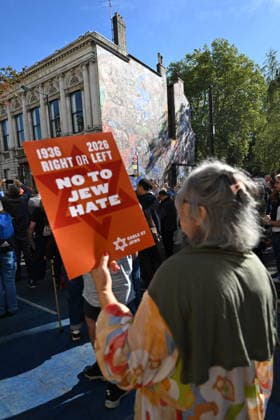 October 4, 2026, London, London, UK: London, UK. Demonstrators representing the Jewish Block take part in a march and rally to mark the 90th anniversary of The Battle of Cable Street in the East End of London. All over the country in 1936, Mosley s British Union of Fascists were chased off the streets by a strong working class who knew that the politics of hate and division offers no solutions. The Battle of Cable Street on 4 October 1936 was by far the countryâ€⠢s biggest mobilisation against fascism. London UK - ZUMAl94_ 20261004_zaf_l94_062 Copyright: xRayxTangx