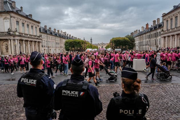Pink October breast cancer awareness run in Nancy NANCY, FRANCE - OCTOBER 4: Security measures are taken as participants wearing pink take part in the Octobre Rose 5k March & Run in Nancy, as part of breast cancer awareness activities in Nancy, France on October 4, 2026. A large crowd gathered at the Palais du Gouvernement before embarking on the five-kilometer course through the city center. Muhammed Said Tako Anadolu Nancy France. Editorial use only. Please get in touch for any other usage.  Copyright: x2026xAnadoluxMuhammedxSaidxTakox
