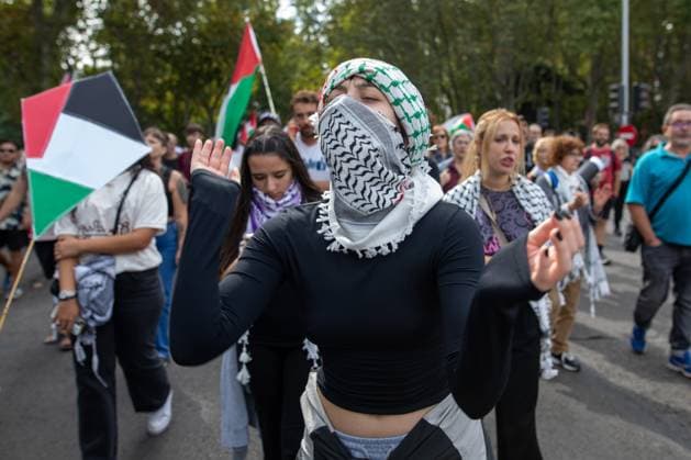 October 4, 2026, Madrid, Spain: A woman protests during a pro-Palestine demonstration.The RESCOP platform (Solidarity Network against the Occupation of Palestine) has called for a nationwide demonstration in solidarity with Palestine, backed by trade union organizations such as the General Confederation of Labor (CGT). The protest is organized under the slogan The genocide continues and aims to draw attention to the ongoing situation faced by the Palestinian population. Madrid Spain - ZUMAs197 20261004_aaa_s197_029 Copyright: xDavidxCanalesx