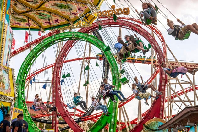 Farewell to the Wiesn: Festivalgoers soar through the Bavarian sky on the Wiellenflug cha