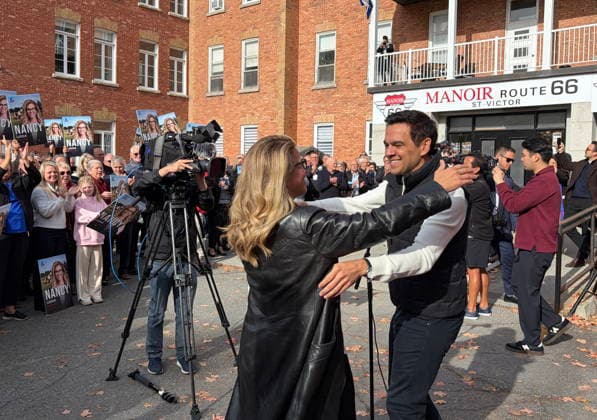 October 4, 2026, St-Victor, Pq, CANADA: Quebec Liberal Party leader Charles Milliard embraces his candidate in Beauce-Nord, Nancy LabbÃ , in St-Victor on Sunday Oct. 4, 2026. St-Victor CANADA  - ZUMAc35_ 20261004_zaf_c35_001 Copyright: xCarolinexPlantex