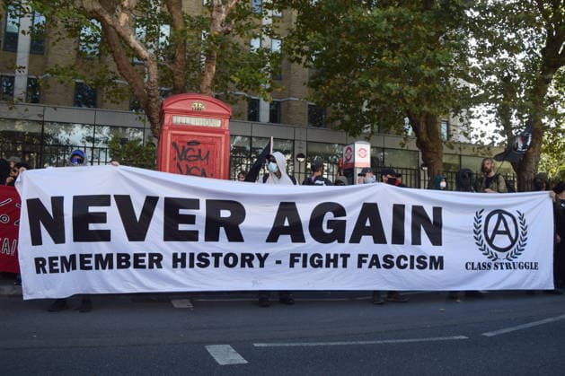 October 4, 2026, London, England, United Kingdom: Protesters march in Whitechapel to Cable Street against racism and fascism, marking the 90th anniversary since the Battle of Cable Street. London United Kingdom  - ZUMAv130 20261004_zip_v130_012 Copyright: xVukxValcicx