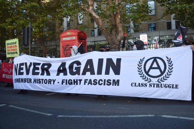 October 4, 2026, London, England, United Kingdom: Protesters march in Whitechapel to Cable Street against racism and fascism, marking the 90th anniversary since the Battle of Cable Street. London United Kingdom  - ZUMAv130 20261004_zip_v130_015 Copyright: xVukxValcicx