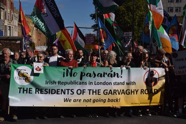 October 4, 2026, London, England, United Kingdom: Protesters, including Labour MP JOHN MCDONNELL, hold a banner stating Irish Republicans in London stand with the residents of the Garvaghy Road in Whitechapel during the march to Cable Street against racism and fascism, marking the 90th anniversary since the Battle of Cable Street. London United Kingdom  - ZUMAv130 20261004_zip_v130_017 Copyright: xVukxValcicx