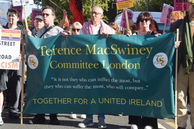 October 4, 2026, London, England, United Kingdom: Protesters hold a Terence MacSwiney Committee London banner stating Together for a united Ireland during the march to Cable Street against racism and fascism, marking the 90th anniversary since the Battle of Cable Street. London United Kingdom - ZUMAv130 20261004_zip_v130_018 Copyright: xVukxValcicx