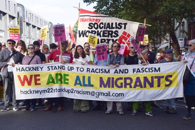 October 4, 2026, London, England, United Kingdom: Protesters hold a We are all migrants banner during the march to Cable Street against racism and fascism, marking the 90th anniversary since the Battle of Cable Street. London United Kingdom  - ZUMAv130 20261004_zip_v130_041 Copyright: xVukxValcicx