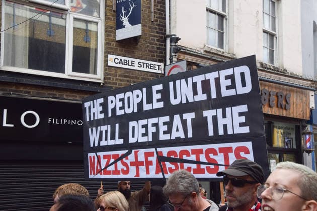October 4, 2026, London, England, United Kingdom: Protesters march through Cable Street against racism and fascism, marking the 90th anniversary since the Battle of Cable Street. London United Kingdom - ZUMAv130 20261004_zip_v130_056 Copyright: xVukxValcicx