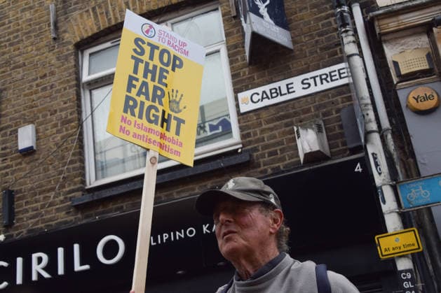 October 4, 2026, London, England, United Kingdom: Protesters march through Cable Street against racism and fascism, marking the 90th anniversary since the Battle of Cable Street. London United Kingdom - ZUMAv130 20261004_zip_v130_057 Copyright: xVukxValcicx