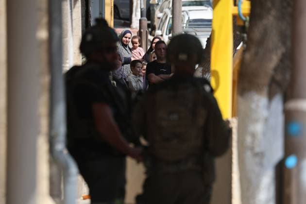 October 4, 2026, Hebron, Palestine, State of: HEBRON, OCCUPIED WEST BANK, OCTOBER 4, 2026: Newly installed Israeli military gates are seen near entrances to Hebron s Old City as Israeli forces impose additional movement restrictions in the area. One of the new iron gates was installed in the Al-Zahid area, a key route connecting neighborhoods of the Old City and providing access toward the Ibrahimi Mosque. Local shop owner Badr al-Tamimi said the restrictions were affecting access to more than 1,000 commercial shops and over 500 homes in the area. Hebron Palestine, State of - ZUMAq101 20261004_zna_q101_062 Copyright: xMosabxShawerx