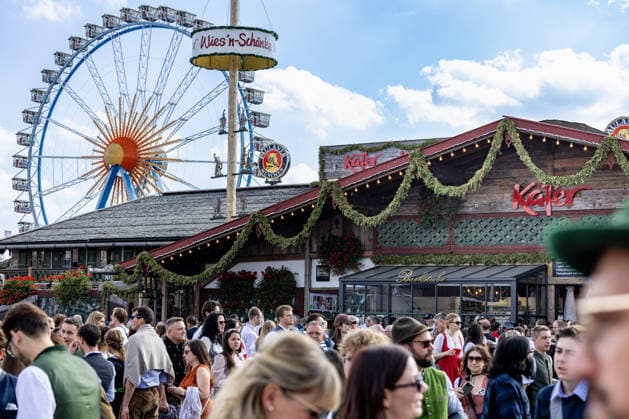 Oktoberfest 2026 in Munich, October 4, 2026. Numerous visitors in front of the Käfer Festzelt on the festival grounds.
