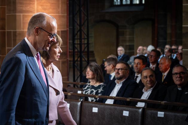 Ecumenical service at St. Petri Cathedral; Federal Chancellor Friedrich Merz and his wife, Charlotte Merz, upon their arrival at the cathedral; Official central celebrations for German Unity Day 2026 in Bremen, Bremen, Germany; Downtown Bremen