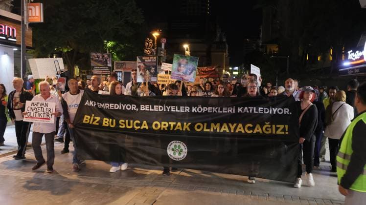 October 4, 2026, Izmir, To¼rkiye: IZMIR, TURKEY †OCTOBER 4, 2026: Animal rights activists staged a protest in Izmir on World Animal Protection Day, opposing the decision to round up and euthanize stray animals. Members of the Izmir Right to Life Advocates gathered in front of Alsancak Train Station in the Konak district and protested against the Law Amending the Animal Protection Act, which was passed by the Grand National Assembly of Turkey on July 30, 2024, published in the Official Gazette on August 2, 2024, and entered into force. Activists marched from Alsancak Station along Cyprus Martyrs Street before gathering in front of the To¼rkan Saylan Cultural Center. Chanting slogans including â€oeNo to your laws, let the anima - ZUMAq101 20261004_zna_q101_116 Copyright: xTurgayxKilicx