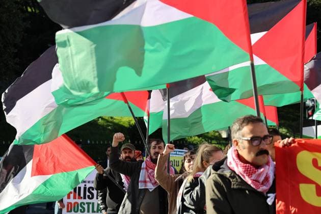 Pro-Palestinian protesters march through Istanbul ISTANBUL, TURKIYE, OCTOBER 4, 2026: Hundreds of demonstrators gather outside the Ataturk Cultural Center in Taksim before marching toward Dolmabahce during a protest organized by the Palestine Action Committee marking three years since the start of the Gaza war. Participants carried Palestinian flags and called for a full embargo on Israel and an end to commercial and diplomatic ties. The march concluded with a statement by organizers in Dolmabahce. istanbul Türkiye Copyright: x xÖzlemxKarayücelx xJNAxPressx