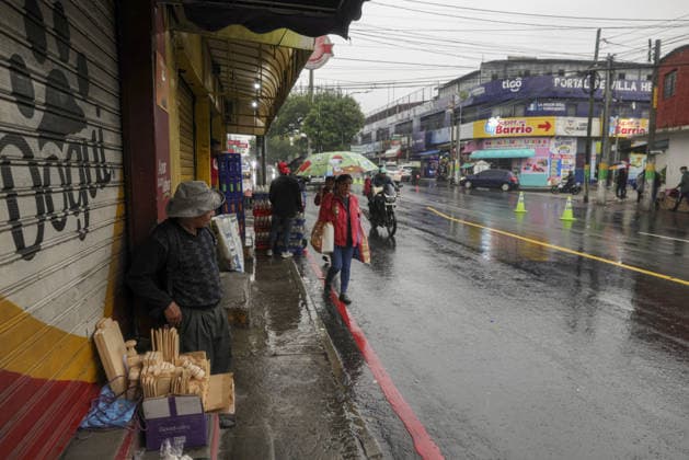 Heavy rains linked to El Nino trigger severe land collapse in Guatemala SAN MIGUEL PETAPA, GUATEMALA - OCTOBER 04: Residents try to go on with their daily lives amid severe damage and collapsed structures in the Villa Hermosa I neighborhood following relentless rainfall and the overflow of the Pinula River in San Miguel Petapa, Guatemala on October 04, 2026. The rising waters, linked to the El Nino phenomenon, triggered extensive riverbank erosion and land loss, damaging several homes and leaving nearby properties at continuous risk of collapse. Luis Vargas Anadolu San Miguel Petapa Guatemala. Editorial use only. Please get in touch for any other usage.  Copyright: x2026xAnadoluxLuisxVargasx