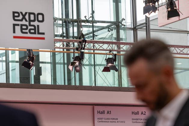 EXPO REAL 2026 in Munich, October 5, 2026: A male trade visitor on his way to the exhibition halls at the Messe München grounds. First day of EXPO REAL 2026, the international trade fair for real estate, investments, and infrastructure will take place from October 5 to 7, 2026, in Mu