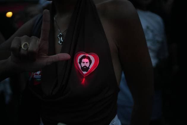 October 4, 2026, Rio De Janeiro, Brazil: RIO DE JANEIRO, BRAZIL, OCTOBER 4, 2026: Supporters of Brazilian President Luiz Inacio Lula da Silva gather in Rio de Janeiro to follow the results of the first round of Brazil s presidential election. Senator Flavio Bolsonaro finished first with 47.03 percent of valid votes, while Lula received 45.16 percent, sending the presidential race to a runoff after neither candidate secured an outright majority. The second round is scheduled for October 25 Rio De Janeiro Brazil - ZUMAq101 20261004_zna_q101_171 Copyright: xMarianaxGreifx