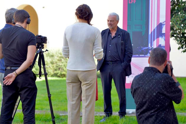 IPA89303245 - Lucca, October 4, 2026 Today is the last day of the Lucca Film Festival, which, as always, is full of surprises. Giovanni Veronesi, screenwriter and director of many films, arrives at the San Micheletto complex. In the photo: Giovanni Veronesi being interviewed.  Copyright: xRobertoCappelloxfotografox xRobertoCappelloxfotografox IPA89303245