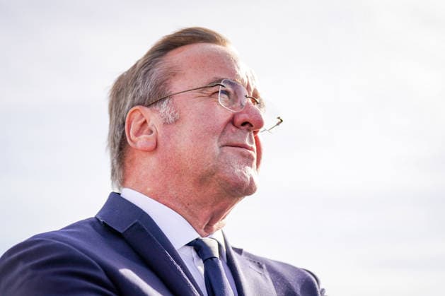 Germany, Emden: Federal Minister of Defense Boris Pistorius gazes into the distance during a press conference on the decision regarding the German Navy’s new naval base in Emden. Flags are visible in the background. Portrait, side profile, low-angle shot, Boris Pistorius, Federal Minister of Defense, Federa Copyright: xJOERANxSTEINSIEKx