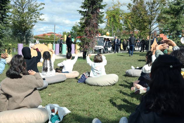 Turkish President Recep Tayyip Erdogan ISTANBUL, TURKIYE - OCTOBER 5: (----EDITORIAL USE ONLY - MANDATORY CREDIT - TURKISH PRESIDENCY MUSTAFA KAMACI HANDOUT - NO MARKETING NO ADVERTISING CAMPAIGNS - DISTRIBUTED AS A SERVICE TO CLIENTS----) Turkish President Recep Tayyip Erdogan greets children sitting on grass as he attends the AileFest held at Rami Library in Istanbul, Turkiye, on October 5, 2026. TUR Presidency Mustafa Kamaci Anadolu Istanbul Turkey. Editorial use only. Please get in touch for any other usage.  Copyright: x2026xAnadoluxTURxPresidencyx xMustafaxKamacix