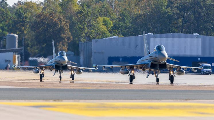 Eurofighters at Nuremberg Airport: German Air Force Conducts Dispersed Operation Drill, Nuremberg, October 5, 2026 Two German Air Force Eurofighters taxi side by side across the airport apron. The German Air Force is testing there how fighter jets and operational forces can temporarily operate out of a civilian airport. Nuremberg Airport, Bavaria, Germany 20261005-1V9A1124-M4000
