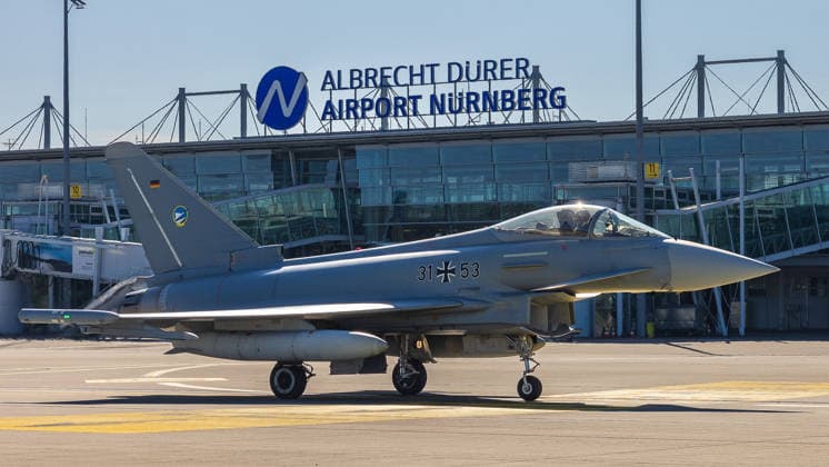 Eurofighter at Nuremberg Airport: German Air Force Conducts Dispersed Operation, Nuremberg, October 5, 2026 A German Air Force Eurofighter Typhoon with the tail number 31 53 taxis across the apron at the airport. The German Air Force is conducting tests there to determine how fighter jets and operational forces can temporarily operate out of a civilian airport. Nuremberg Airport, Bavaria, 20261005-286A0105-M4000