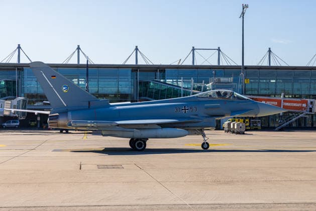 Eurofighter at Nuremberg Airport: German Air Force Conducts Dispersed Operation Drill, Nuremberg, October 5, 2026 A German Air Force Eurofighter Typhoon with the tail number 31 53 taxis across the apron at the airport. The German Air Force is conducting tests there to determine how fighter jets and operational forces can temporarily operate out of a civilian airport. Nuremberg Airport, Bavar 20261005-286A0114-M4000