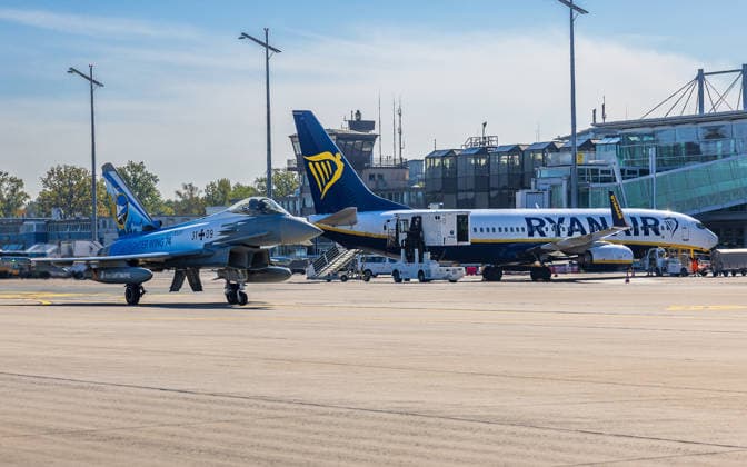 Eurofighter at Nuremberg Airport: German Air Force Practices Dispersed Operations, Nuremberg, October 5, 2026 A German Air Force Eurofighter with special livery and the tail number 31 09 is parked on the airport apron next to a Ryanair Boeing 737-800. The German Air Force is conducting tests there to how Eurofighters and military personne 20261005-286A0122-M4000