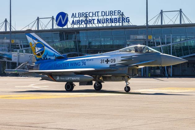 Eurofighter at Nuremberg Airport: German Air Force Practices Dispersed Operations, Nuremberg, October 5, 2026 A Eurofighter Typhoon from the German Air Force’s 74th Tactical Wing, sporting a special livery to mark the 65th anniversary, taxis across the apron at the airport. The German Air Force is testing there how Eurofighters and operatio 20261005-286A0134-M4000