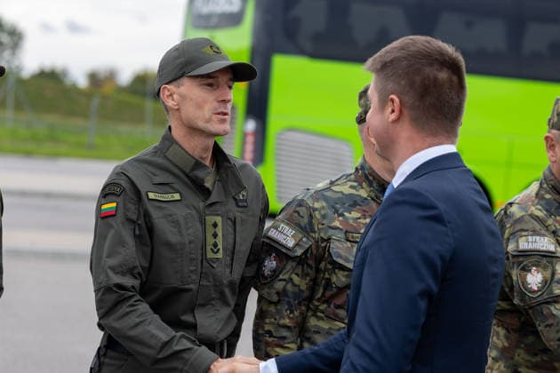 The meeting between Martynas Katelynas and Marcin Kierwinski at the Budzisko Border Control Point on October 5, 2026, in Budzisko  Copyright: xTeodorasxBiliÅ«nas BNSx