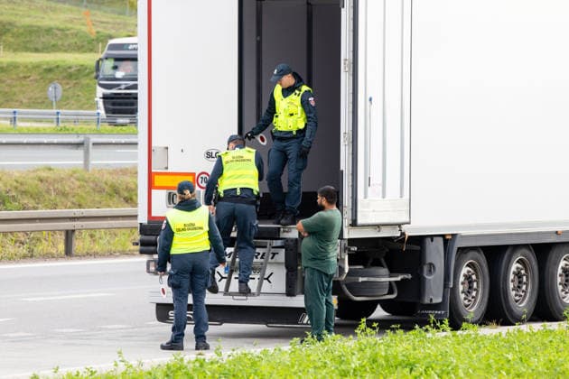 The meeting between Martynas Katelynas and Marcin Kierwinski at the Budzisko Border Control Point on October 5, 2026, in Budzisko  Copyright: xTeodorasxBiliÅ«nas BNSx