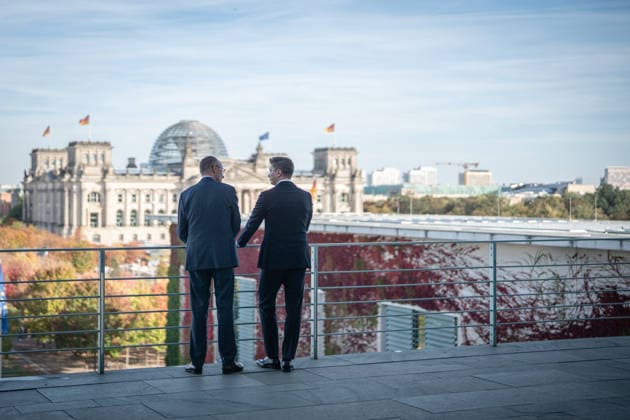 Chancellor Friedrich Merz with his guest Mindaugas Sinkeviciusius, Prime Minister of Lithuania, at the Federal Chancellery; on the terrace of the Federal Chancellery overlooking the Reichstag building, which houses the Bundestag; the Federal Chancellor receives the Prime Minister of the Republic of Lithuania at the Federal Chancellery, Berlin, Germany; Federal Chancellery