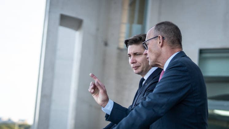 Chancellor Friedrich Merz with his guest Mindaugas Sinkeviciusius, Prime Minister of Lithuania, at the Federal Chancellery; on the terrace of the Federal Chancellery overlooking the Reichstag building, which houses the Bundestag; the Federal Chancellor receives the Prime Minister of the Republic of Lithuania at the Federal Chancellery, Berlin, Germany; Federal Chancellery
