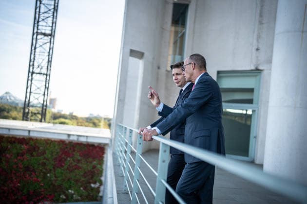 Chancellor Friedrich Merz with his guest Mindaugas Sinkeviciusius, Prime Minister of Lithuania, at the Federal Chancellery; on the terrace of the Federal Chancellery overlooking the Reichstag building, which houses the Bundestag; the Federal Chancellor receives the Prime Minister of the Republic of Lithuania at the Federal Chancellery, Berlin, Germany; Federal Chancellery