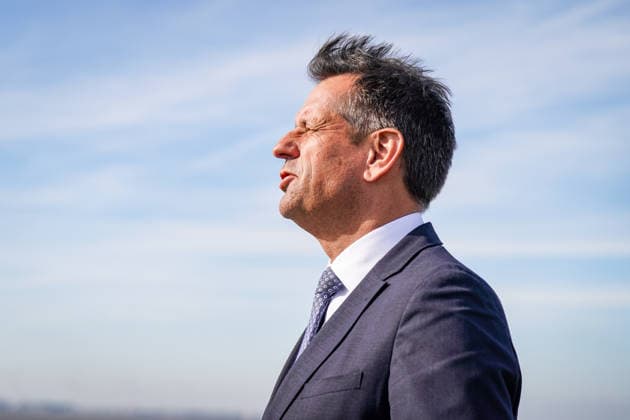 Germany, Emden: Lower Saxony’s Minister President Olaf Lies closes his eyes to enjoy a moment in the sun during a press event regarding the decision on the German Navy’s new naval base in Emden. Portrait, side profile, Olaf Lies, Minister-President, Lower Saxony, state government, German Navy, Bundeswehr, naval base, location decision, Em Copyright: xJOERANxSTEINSIEKx
