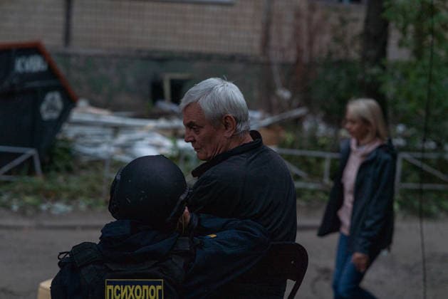 Russian missile attack on Ukraine s Kharkiv KHARKIV, UKRAINE - OCTOBER 5: Civilians are seen as firefighters and emergency service workers operate at the site of a residential building struck by a guided bomb in Kharkiv, Ukraine on October 5, 2026. A guided bomb hit a residential building, killing at least two people and injuring over 30 others. The strike destroyed several parked vehicles and damaged more than 40 surrounding houses, with search, rescue, and cleanup operations ongoing by police, firefighters, and volunteers. Carlo Bravo Anadolu Kharkiv Ukraine. Editorial use only. Please get in touch for any other usage. Copyright: x2026xAnadoluxCarloxBravox