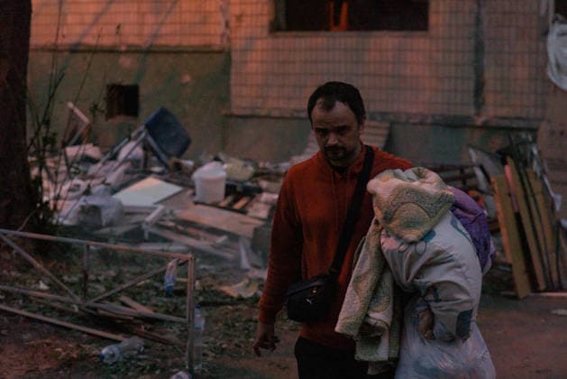 Russian missile attack on Ukraine s Kharkiv KHARKIV, UKRAINE - OCTOBER 5: Civilians are seen as firefighters and emergency service workers operate at the site of a residential building struck by a guided bomb in Kharkiv, Ukraine on October 5, 2026. A guided bomb hit a residential building, killing at least two people and injuring over 30 others. The strike destroyed several parked vehicles and damaged more than 40 surrounding houses, with search, rescue, and cleanup operations ongoing by police, firefighters, and volunteers. Carlo Bravo Anadolu Kharkiv Ukraine. Editorial use only. Please get in touch for any other usage. Copyright: x2026xAnadoluxCarloxBravox
