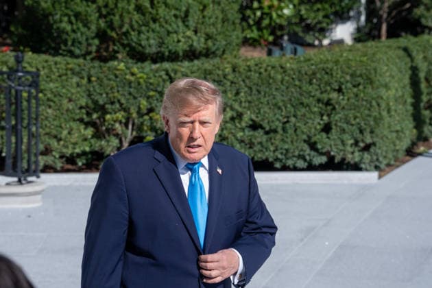 October 5, 2026, Washington, District of Columbia, United States: US President Donald Trump speaks with the White House press corps as he heads to Marine One on October 5, 2026. President Trump is heading to Nebraska to help Republican candidates in the upcoming midterm elections. Washington United States  - ZUMAl312 20261005_znp_l312_010 Copyright: xAndrewxLeydenx