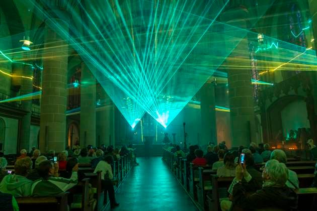 Essen Light Festival, downtown, Licht Segen Lumen Cantus, a laser show synchronized to music at Essen Cathedral, by lighting designer Manfred Olma, accompanied by live organ music, North Rhine-Westphalia, Germany, Essen Light Festival