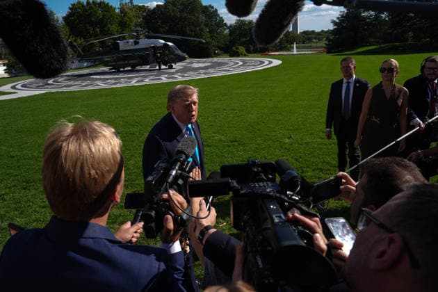 President Trump departs White House for Nebraska midterm campaign rally WASHINGTON, D.C., UNITED STATES - OCTOBER 05: U.S. President Donald Trump speaks to press members before boarding Marine One on the South Lawn of the White House in Washington, D.C., on October 5, 2026. Trump is traveling to Nebraska to attend a midterm campaign rally. Mehmet Eser Anadolu Washington, D.C. United States. Editorial use only. Please get in touch for any other usage.  Copyright: x2026xAnadoluxMehmetxEserx