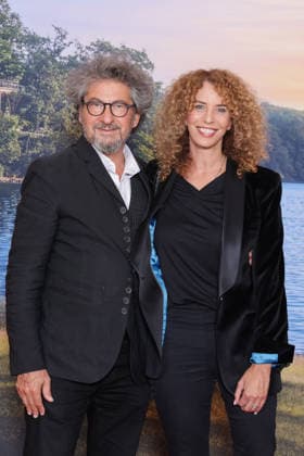 La Maison De Nos Reves Premiere - Paris Radu Mihaileanu and his wife attend the photocall for the premiere of La Maison De Nos Reves held at the Grand Rex Cinema in Paris, France on October 5, 2026. Photo by David Boyer ABACAPRESS.COM Paris France  Copyright: xBoyerxDavid ABACAx