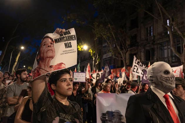 October 5, 2026, Barcelona, Catalonia, Spain: A protester is seen displaying a portrait of Maricarmen, the elderly woman evicted in Madrid. Mobilized by the Barcelona Tenants Union and following the expiration of the Maricarmen decree that regulated the right to housing thousands of people have demonstrated in central Barcelona, ??calling for a general strike. Barcelona Spain  - ZUMAs197 20261005_aaa_s197_111 Copyright: xPacoxFreirex