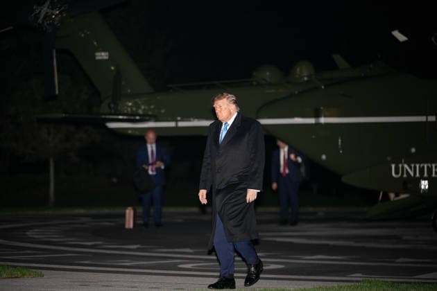 October 5, 2026, Washington, Dc, United States: President DONALD TRUMP walks across the South Lawn after arriving back at the White House aboard Marine One following a trip to Grand Island, Nebraska, where he attended a midterm campaign rally. Washington United States  - ZUMAk206 20261005_znp_k206_032 Copyright: xMattxKaminskyx