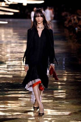 (261006) -- PARIS, Oct. 6, 2026 -- A model presents a creation from the Womenswear Spring Summer 2027 collections by Chanel during the Paris Fashion Week in Paris, France, Oct. 5, 2026. ( Handout via Xinhua) FRANCE-PARIS-FASHION WEEK-CHANEL MeetEurope 